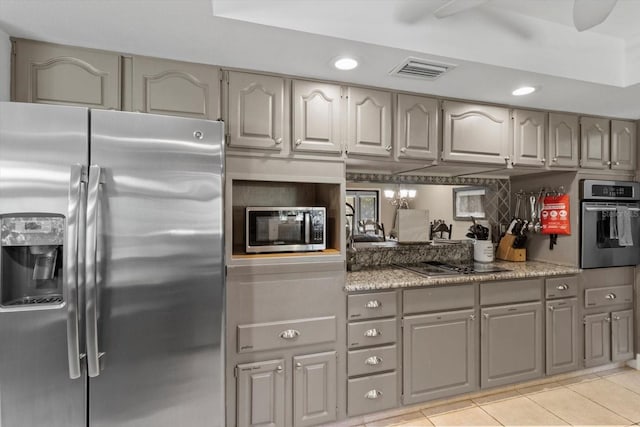 10584 N Dawnflower Pt, Crystal River, FL 34428 - kitchen featuring appliances with stainless steel finishes, gray cabinets, light tile patterned floors, and recessed lighting