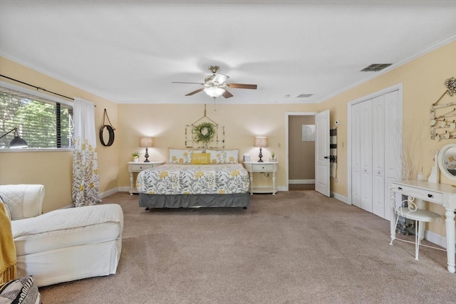 10584 N Dawnflower Pt, Crystal River, FL 34428 - bedroom with carpet flooring, crown molding, a ceiling fan, and a closet