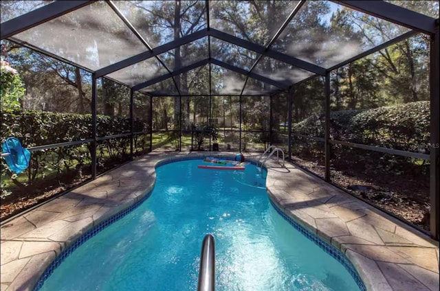 10584 N Dawnflower Pt, Crystal River, FL 34428 - outdoor pool featuring a lanai and a patio area