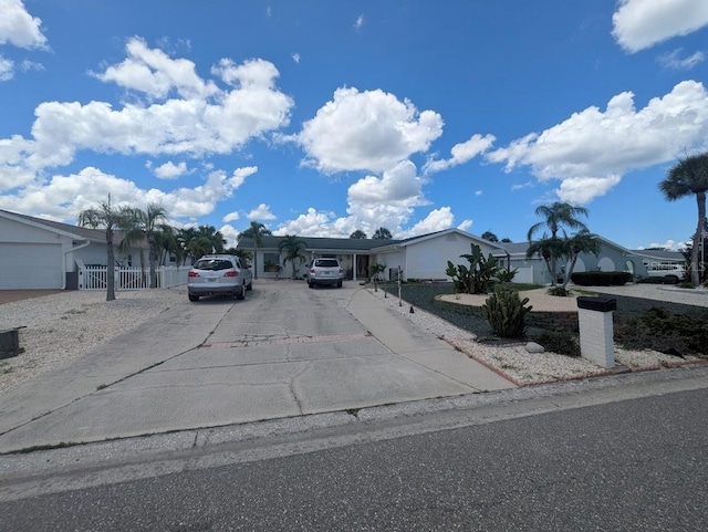 1008 Sago Palm Way, Apollo Beach, FL 33572 - view of front of house featuring driveway and a carport