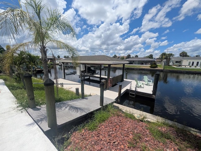1008 Sago Palm Way, Apollo Beach, FL 33572 - dock area featuring boat lift and a water view