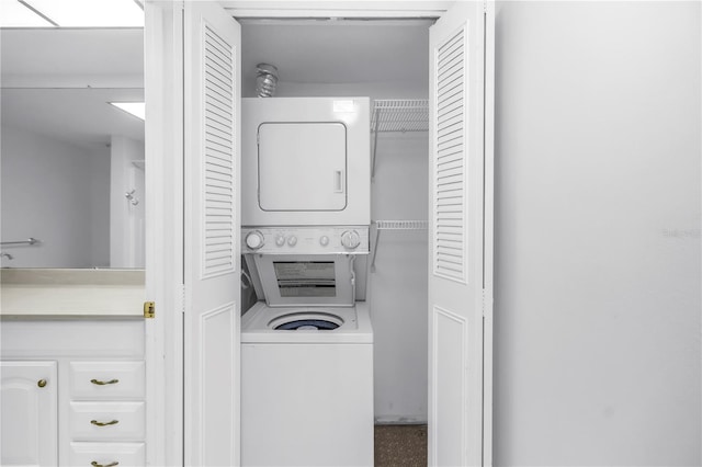 500 N Osceola Ave Unit 211, Clearwater, FL 33755 - laundry room featuring stacked washer and clothes dryer