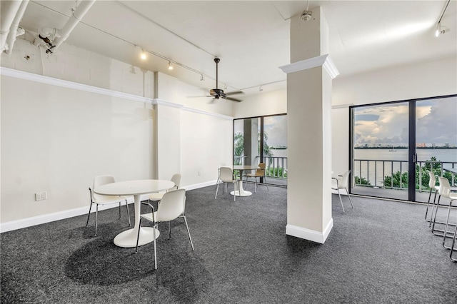500 N Osceola Ave Unit 211, Clearwater, FL 33755 - dining space featuring track lighting, a water view, and ceiling fan