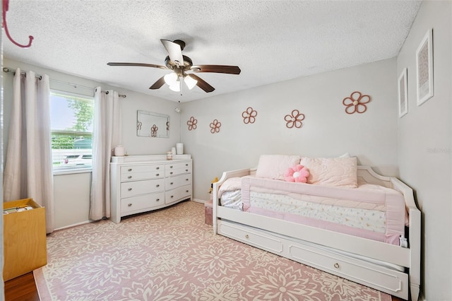 602 Timber Bay Cir W, Oldsmar, FL 34677 - bedroom featuring a textured ceiling and ceiling fan