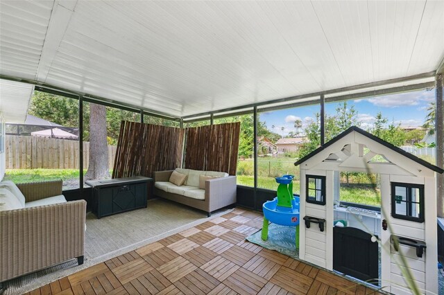 602 Timber Bay Cir W, Oldsmar, FL 34677 - sunroom / solarium with outdoor lounge area and plenty of natural light