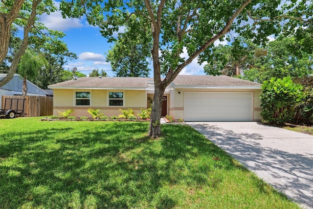 602 Timber Bay Cir W, Oldsmar, FL 34677 - ranch-style home featuring stucco siding, an attached garage, and driveway