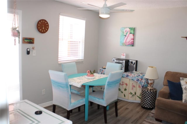 6800 Sunset Way Unit 1708, St Pete Beach, FL 33706 - dining room with healthy amount of natural light, wood finished floors, and a ceiling fan