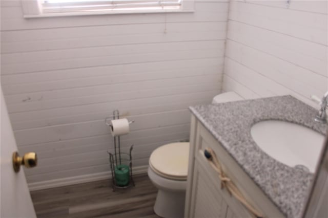 6800 Sunset Way Unit 1708, St Pete Beach, FL 33706 - half bath featuring wood finished floors and vanity