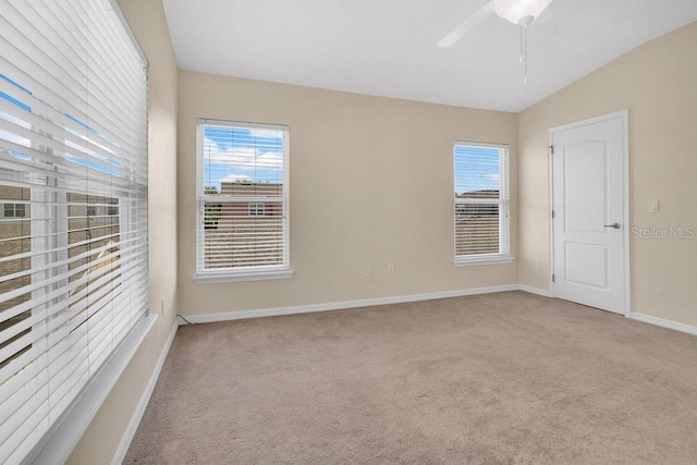 12975 Calderdale Ave, Windermere, FL 34786 - empty room with carpet flooring, plenty of natural light, a ceiling fan, and lofted ceiling