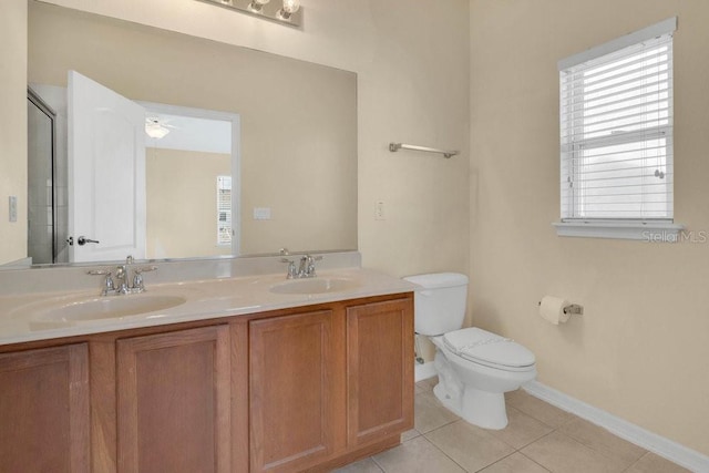 12975 Calderdale Ave, Windermere, FL 34786 - full bath featuring tile patterned floors, double vanity, and plenty of natural light