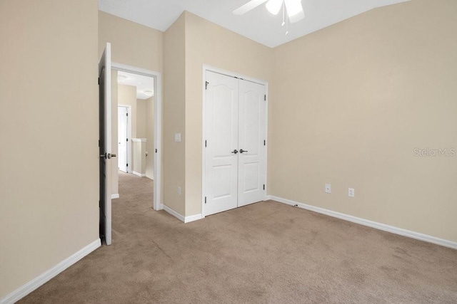 12975 Calderdale Ave, Windermere, FL 34786 - unfurnished bedroom with carpet flooring, a closet, and a ceiling fan
