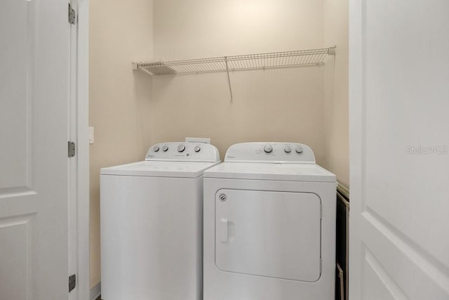 12975 Calderdale Ave, Windermere, FL 34786 - laundry room with washing machine and clothes dryer
