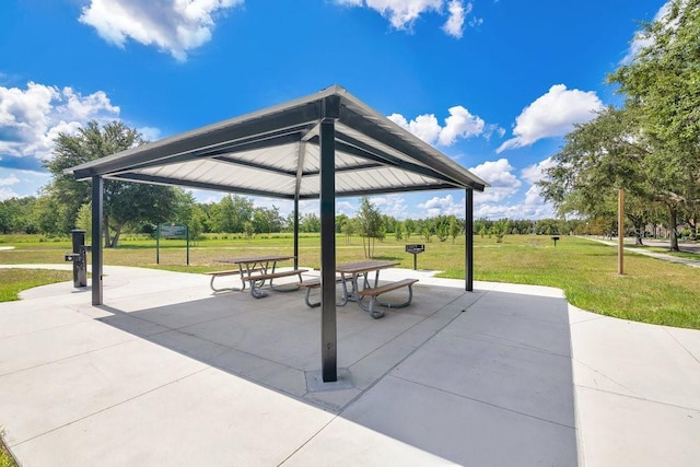 12975 Calderdale Ave, Windermere, FL 34786 - view of home's community with a gazebo, a lawn, and a patio area