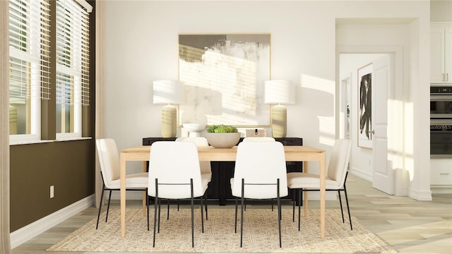 6830 E 115th St, Palmetto, FL 34221 - dining area featuring light wood-style floors and baseboards