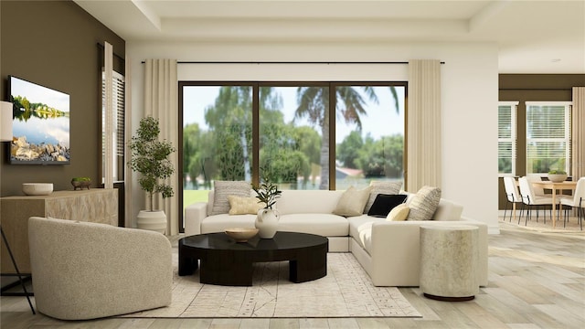 6830 E 115th St, Palmetto, FL 34221 - living area with wood finished floors, a water view, and a raised ceiling