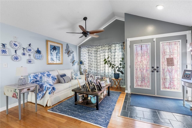 12234 Cider Mill Ln, Hudson, FL 34667 - living room featuring lofted ceiling, a ceiling fan, wood finished floors, and french doors
