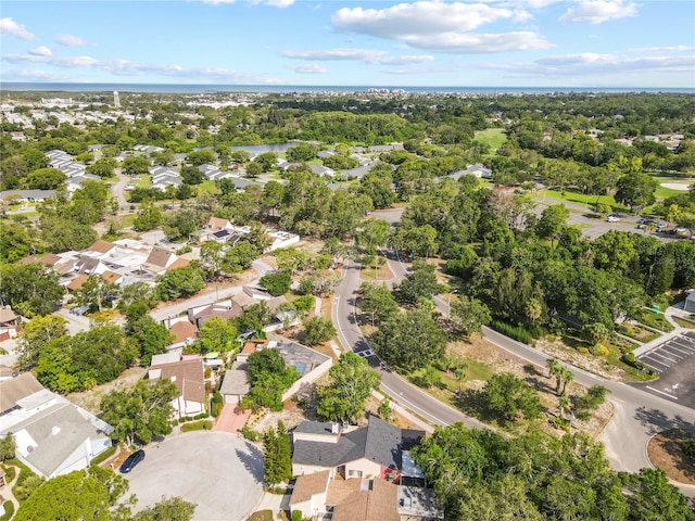 12234 Cider Mill Ln, Hudson, FL 34667 - aerial view of property and surrounding area featuring a large body of water and nearby suburban area