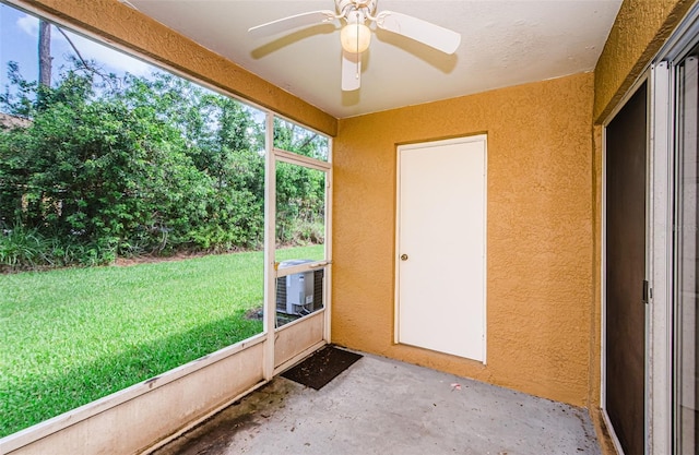 1241 Redondo Way, Wesley Chapel, FL 33543 - unfurnished sunroom with a ceiling fan