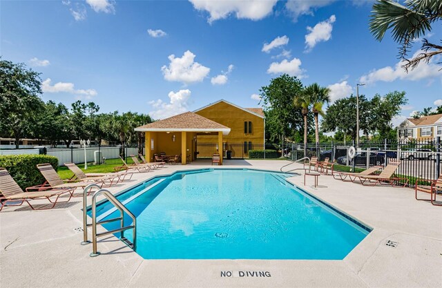 1241 Redondo Way, Wesley Chapel, FL 33543 - community pool featuring a patio area