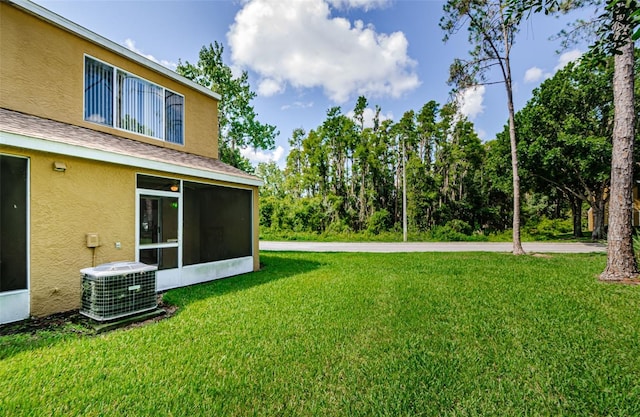 1241 Redondo Way, Wesley Chapel, FL 33543 - view of grassy yard with a sunroom