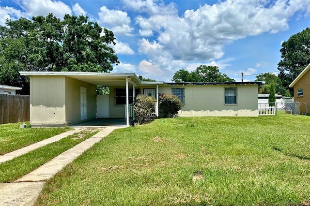 5016 S 86th St, Tampa, FL 33619 - view of front of home featuring driveway and an attached carport