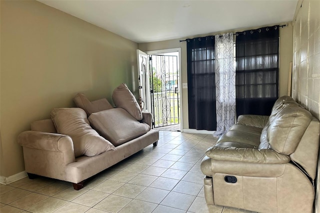 5016 S 86th St, Tampa, FL 33619 - living room with light tile patterned floors