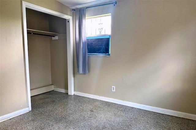 5016 S 86th St, Tampa, FL 33619 - unfurnished bedroom with light speckled floor and a closet