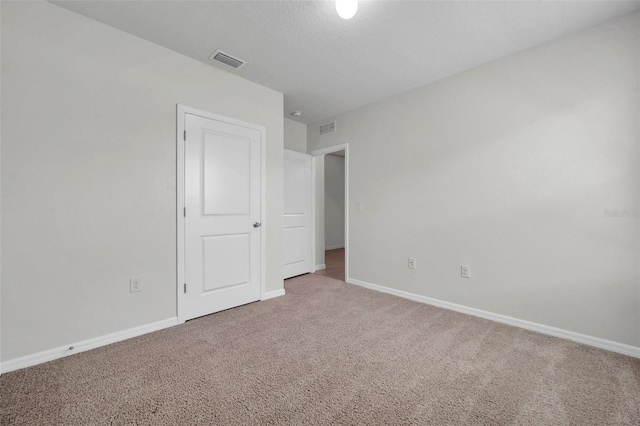 30732 Summer Sun Loop, Wesley Chapel, FL 33545 - unfurnished bedroom featuring carpet floors and baseboards