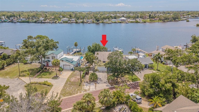 739 Chesapeake Dr, Tarpon Springs, FL 34689 - aerial view of residential area with a nearby body of water