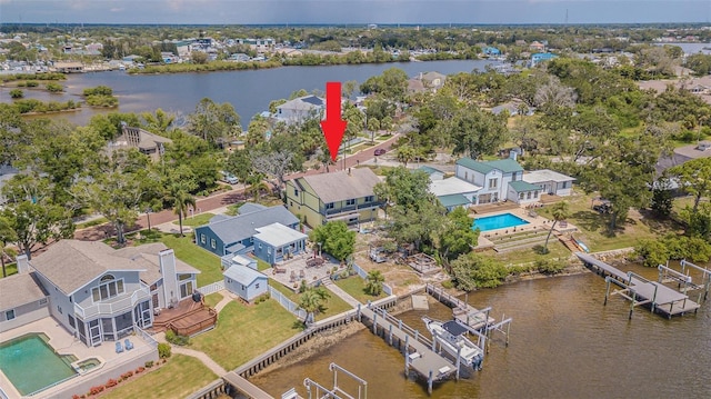 739 Chesapeake Dr, Tarpon Springs, FL 34689 - aerial perspective of suburban area with a pool area and a nearby body of water