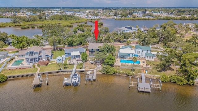 739 Chesapeake Dr, Tarpon Springs, FL 34689 - aerial view of residential area with a pool area and a large body of water