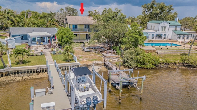 739 Chesapeake Dr, Tarpon Springs, FL 34689 - dock area with boat lift and a water view