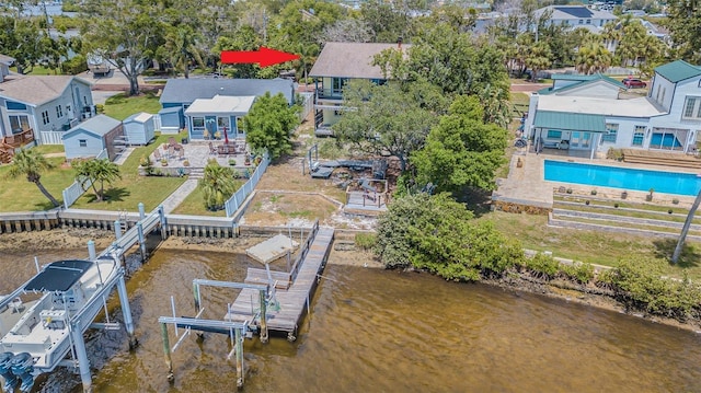 739 Chesapeake Dr, Tarpon Springs, FL 34689 - aerial view of residential area featuring a large body of water and a pool