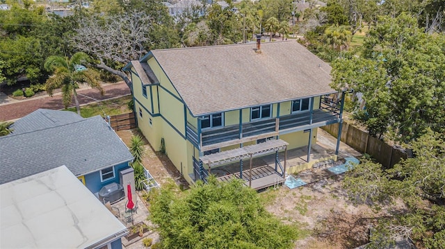 739 Chesapeake Dr, Tarpon Springs, FL 34689 - aerial view of property and surrounding area with a tree filled landscape