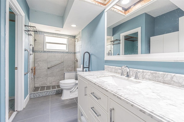 739 Chesapeake Dr, Tarpon Springs, FL 34689 - bathroom featuring vanity, tile patterned floors, a stall shower, and recessed lighting