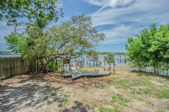 739 Chesapeake Dr, Tarpon Springs, FL 34689 - view of yard with a dock