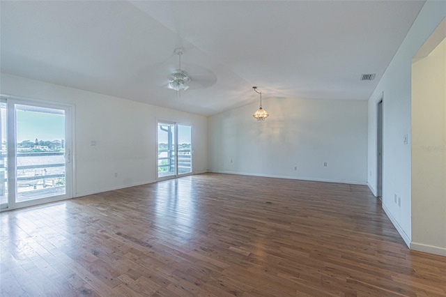739 Chesapeake Dr, Tarpon Springs, FL 34689 - unfurnished room with lofted ceiling, ceiling fan, and wood finished floors