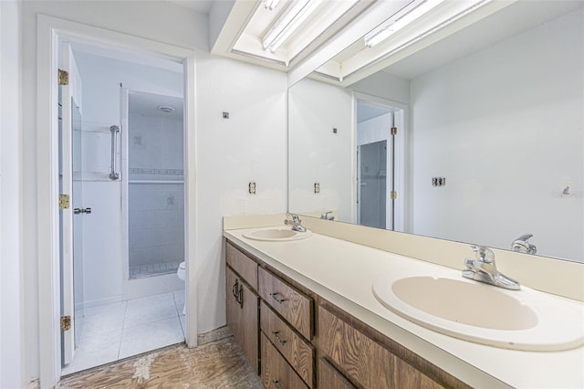 739 Chesapeake Dr, Tarpon Springs, FL 34689 - bathroom with a shower stall and double vanity