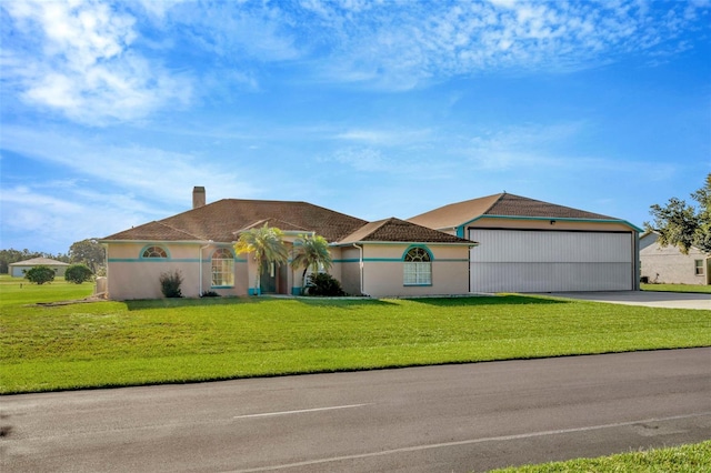 11908 Pilot Country Dr, Spring Hill, FL 34610 - view of front of home with stucco siding, driveway, a chimney, a front yard, and a garage