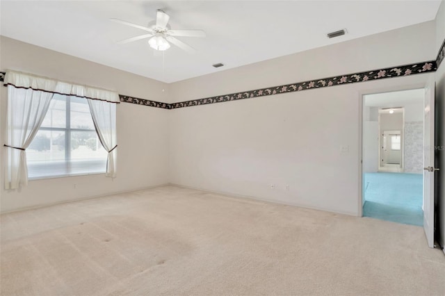 11908 Pilot Country Dr, Spring Hill, FL 34610 - carpeted empty room featuring a ceiling fan