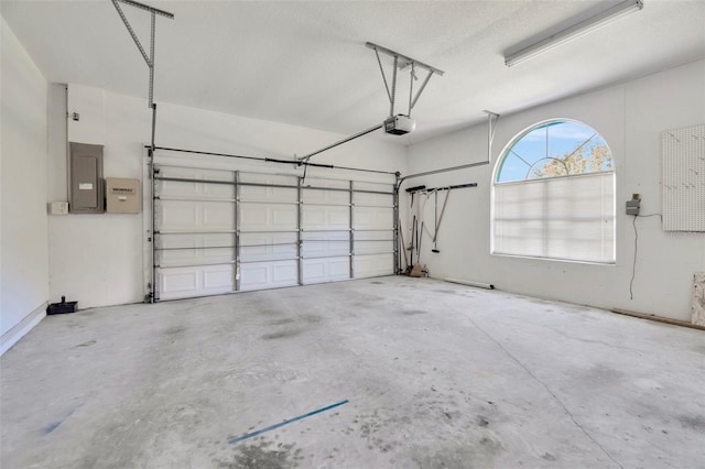 11908 Pilot Country Dr, Spring Hill, FL 34610 - garage with electric panel and a garage door opener