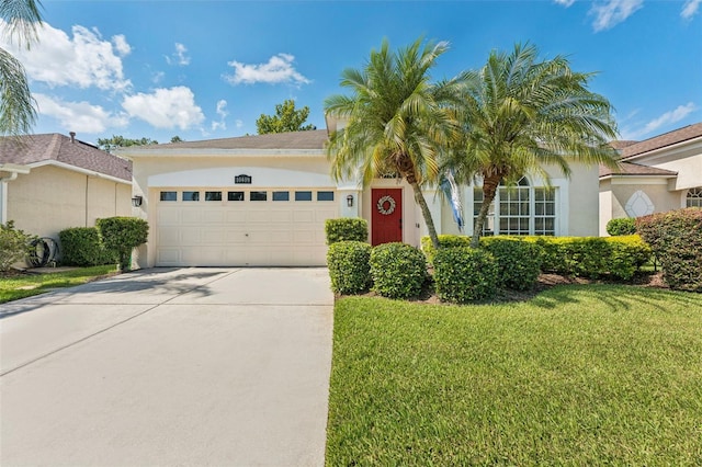10409 Glen Willow Ln, Tampa, FL 33647 - view of front facade with stucco siding, an attached garage, concrete driveway, and a front yard