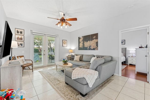 10409 Glen Willow Ln, Tampa, FL 33647 - living area with a ceiling fan and light tile patterned flooring
