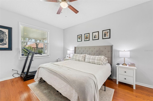 10409 Glen Willow Ln, Tampa, FL 33647 - bedroom featuring light wood finished floors and a ceiling fan