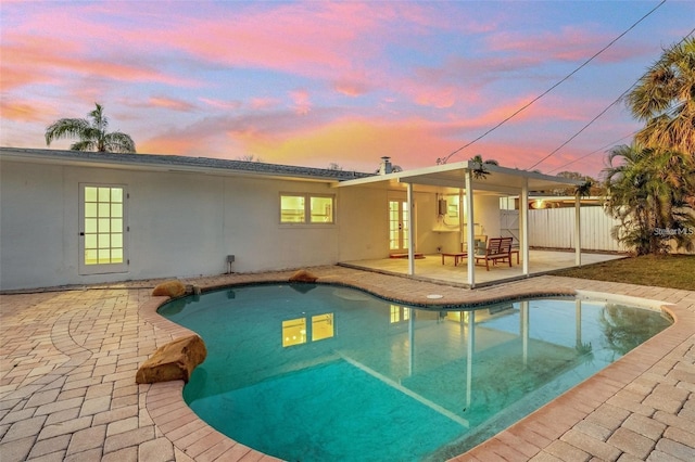 1320 Dixie Ln S, Saint Petersburg, FL 33707 - view of pool with french doors and a patio area