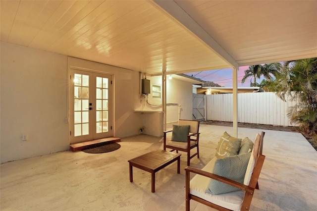 1320 Dixie Ln S, Saint Petersburg, FL 33707 - view of patio with french doors and an outdoor living space