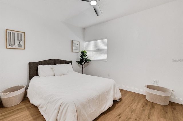 1320 Dixie Ln S, Saint Petersburg, FL 33707 - bedroom featuring wood finished floors and ceiling fan
