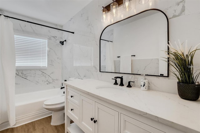 1320 Dixie Ln S, Saint Petersburg, FL 33707 - bathroom featuring vanity, shower / bathtub combination with curtain, and wood finished floors