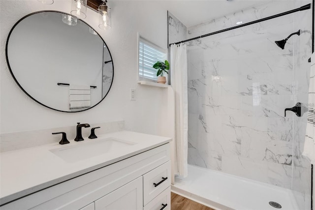 1320 Dixie Ln S, Saint Petersburg, FL 33707 - full bathroom featuring vanity and a marble finish shower