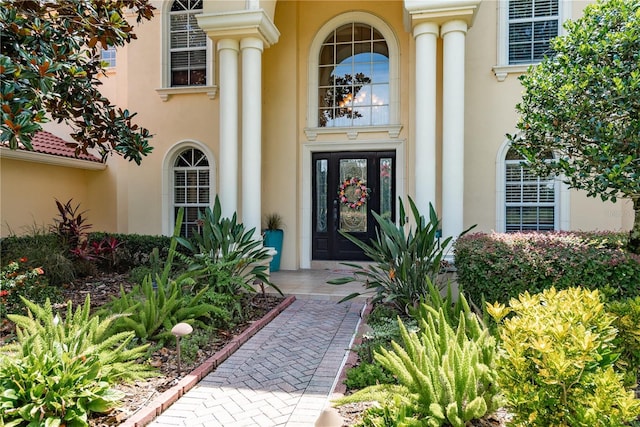 3042 Wentworth Way, Tarpon Springs, FL 34688 - property entrance with stucco siding